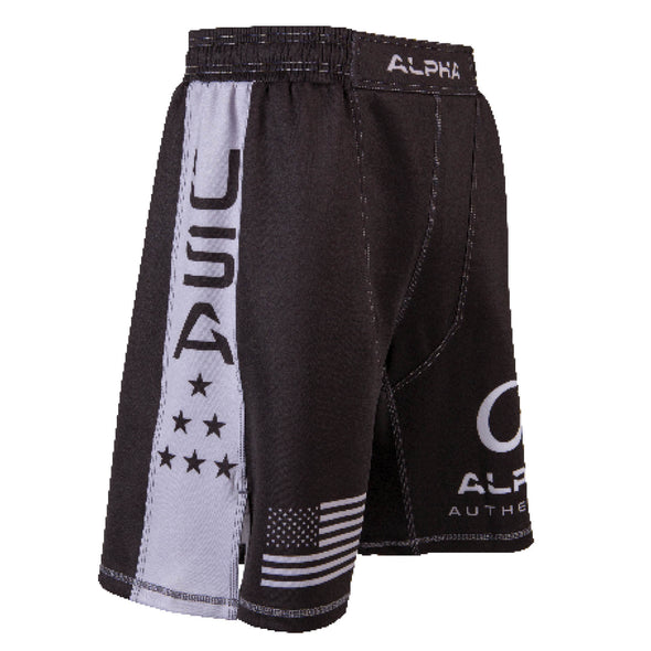 Side of black and grey fighter shorts used for wrestling, USA flag on right leg, USA with stacked stars on side of leg.