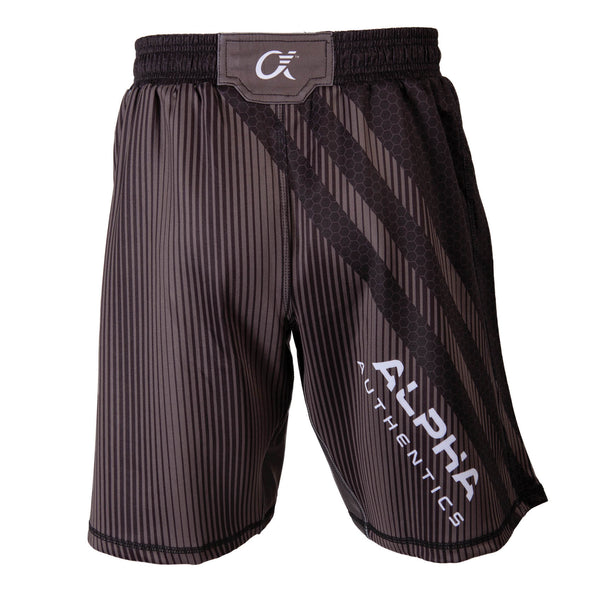 Back of black and grey fighter shorts used for wrestling, hex pattern, thin vertical stripes, large diagonal stripes, Alpha Authentics logo on left leg.